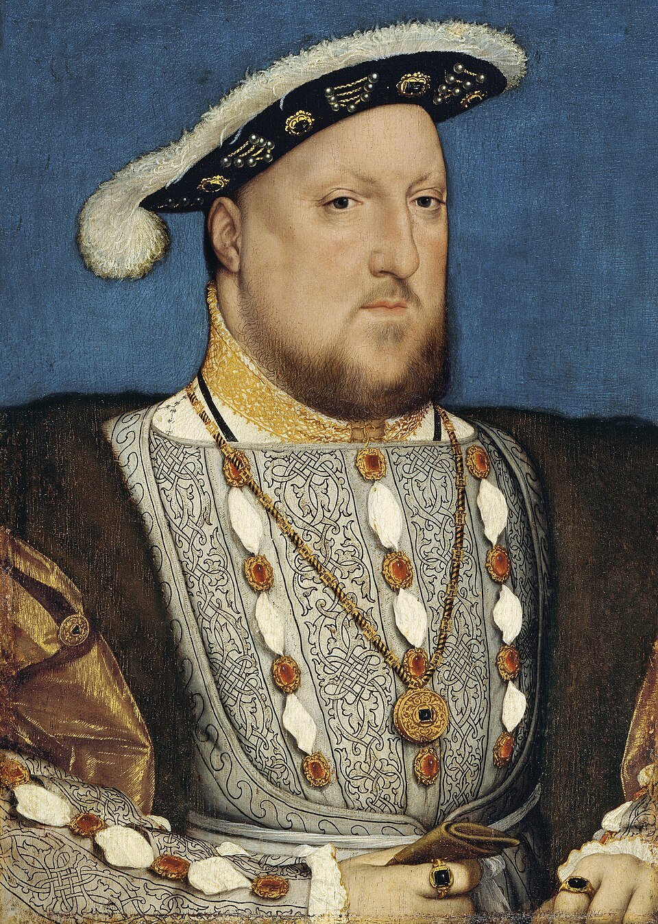 A painted portrait of a broad-shouldered king in a slashed and jewelled doublet with a flat feathered cap, one hand resting at his waist.