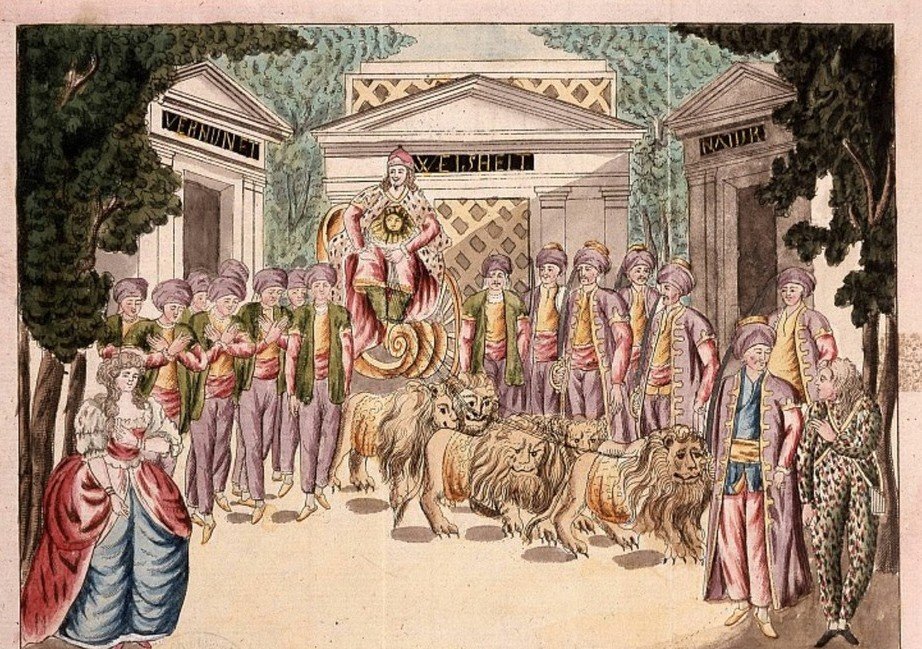 A hand-coloured stage design showing a figure enthroned on a chariot drawn by lions before three classical temples, with a crowd in turbans and a man in a feathered costume.