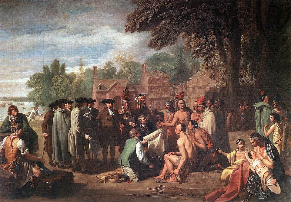 An oil painting of men in wide brimmed hats and dark coats standing under a tree handing rolls of cloth to seated and standing figures in loincloths and blankets, with buildings under construction behind.